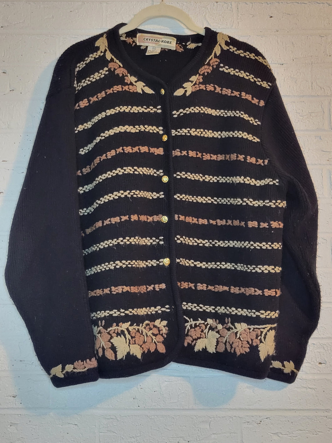 L - leafy sweater
